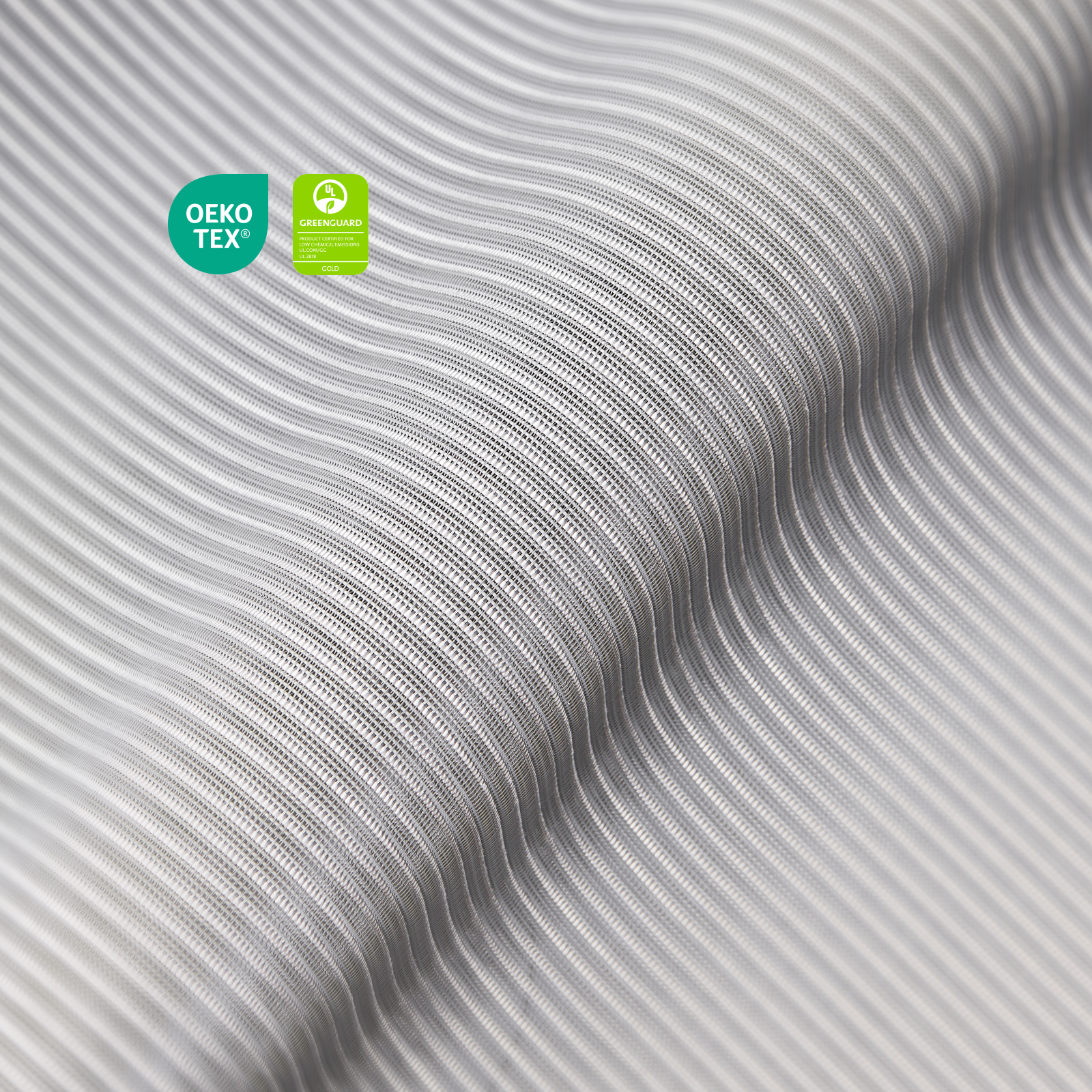 Close-up of COLAMY ATLAS breathable mesh fabric with OEKO-TEX and GREENGUARD Gold certification