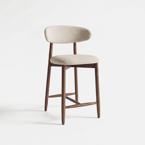 COLAMY ARLA beige upholstered counter stool with wooden legs and curved backrest