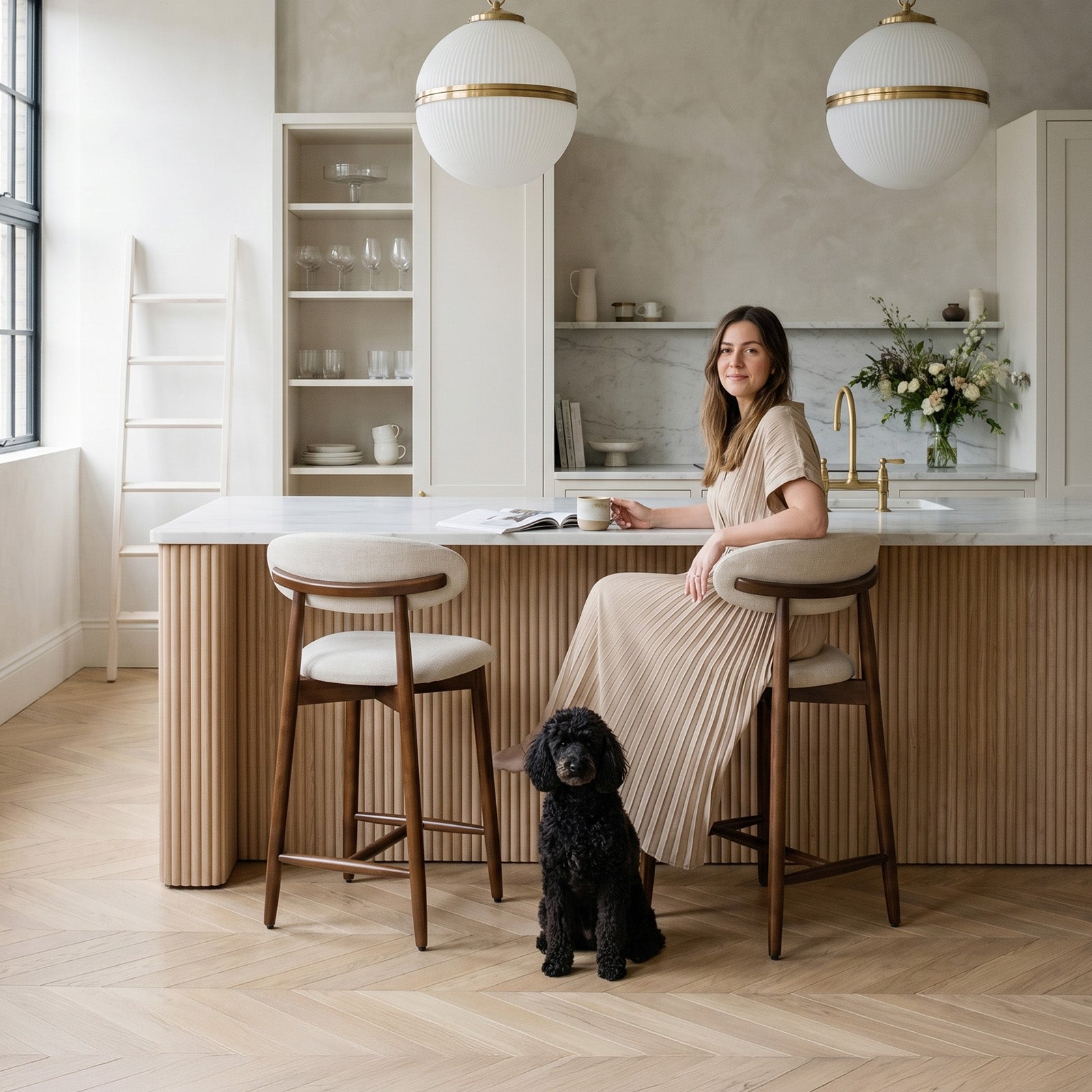 COLAMY ARLA beige upholstered counter stools with wooden legs in a bright kitchen island setting