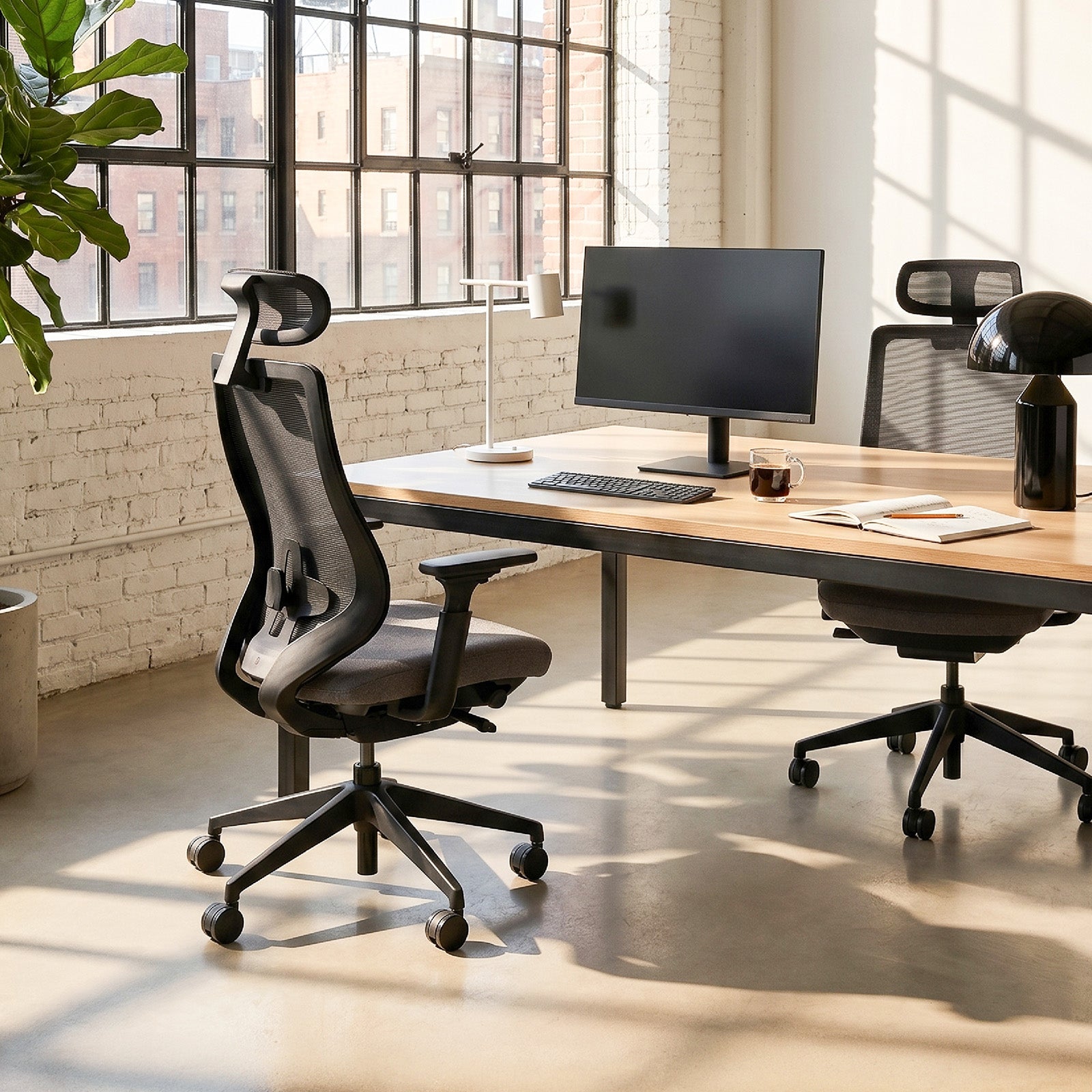 COLAMY ATLAS-01 ergonomic mesh office chair with adjustable headrest in a modern office workspace