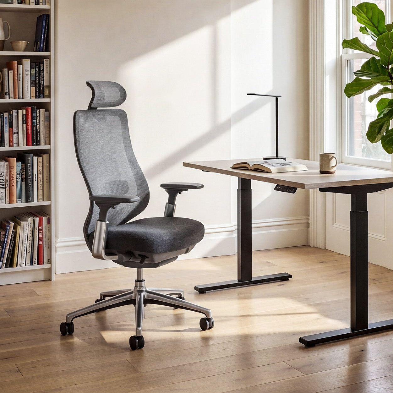 COLAMY ATLAS ergonomic office chair with mesh back paired with a height adjustable work desk