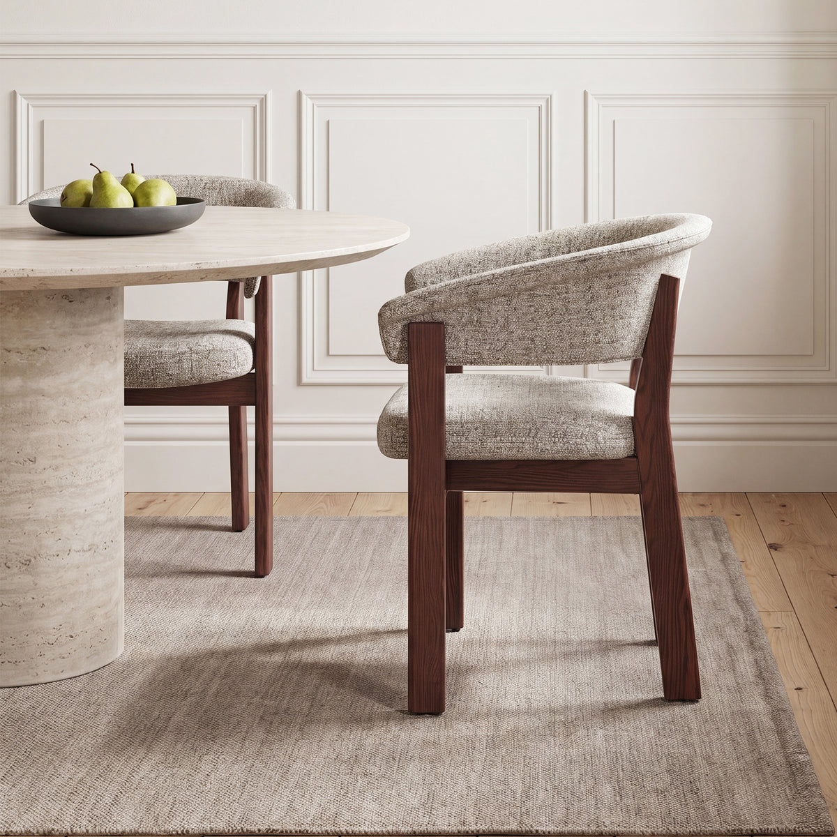 COLAMY Halo Luxe oatmeal upholstered dining chair with walnut-finished solid oak frame beside a round dining table