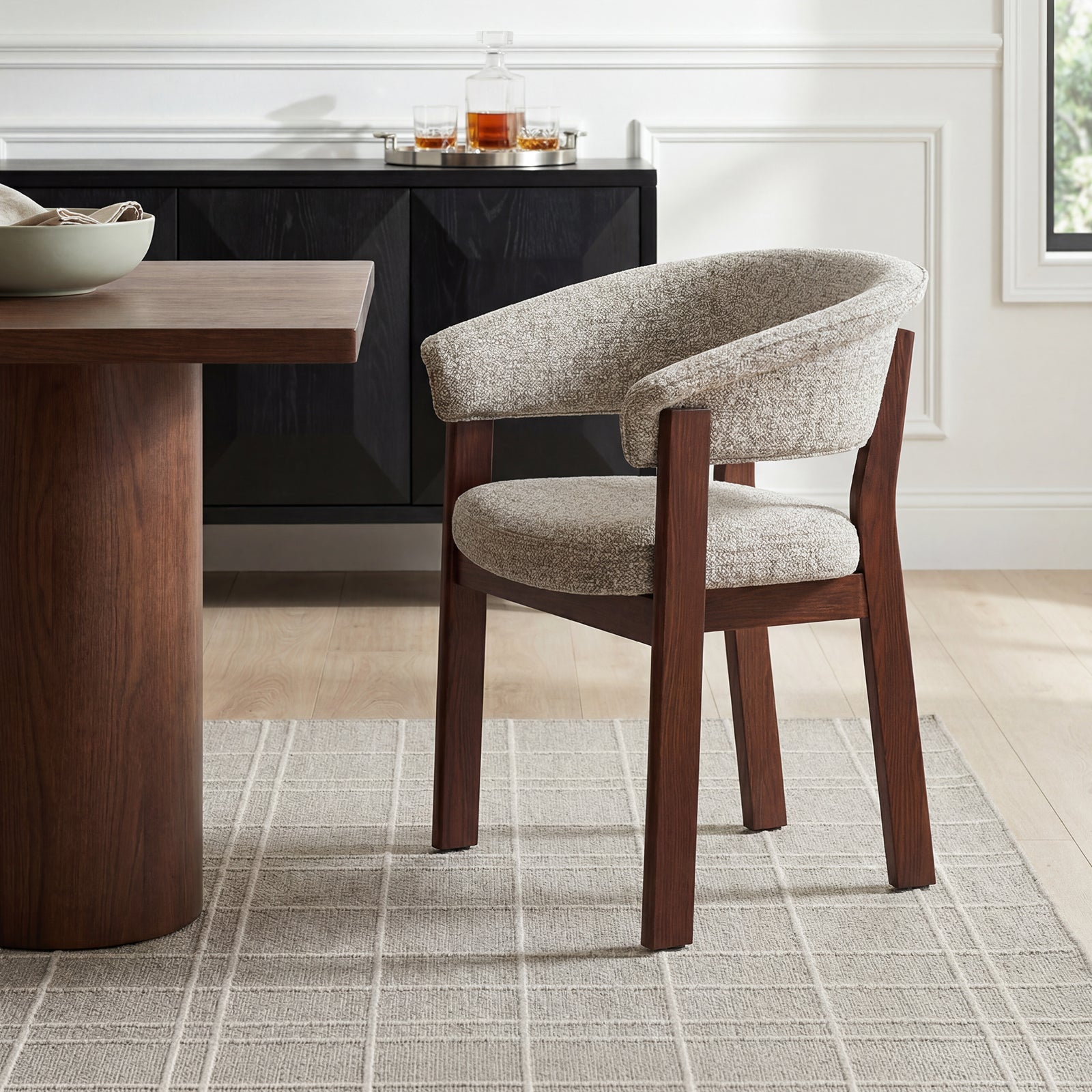 COLAMY Halo Prime oatmeal upholstered armchair with walnut-finished solid oak frame in a modern dining room