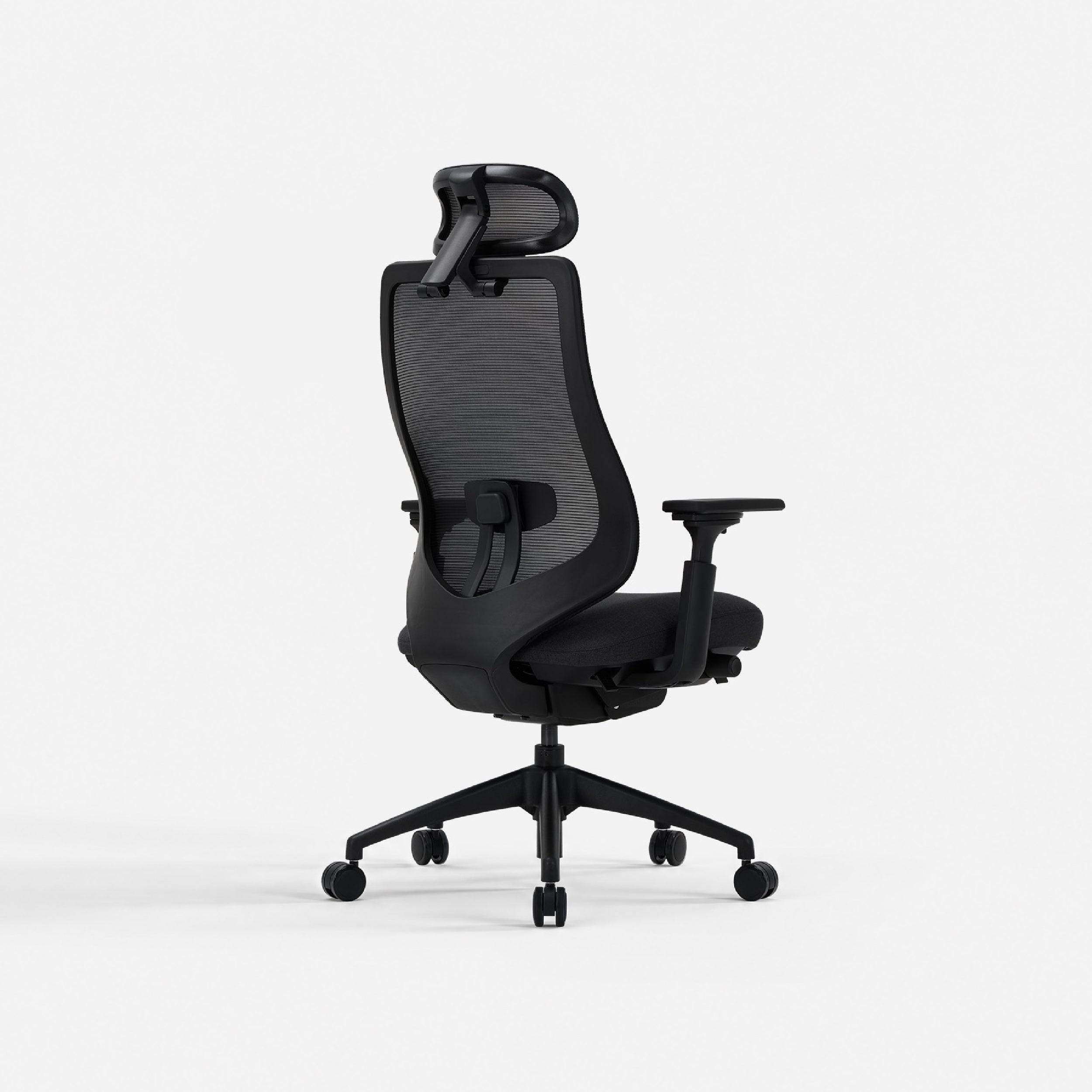 Rear view of COLAMY ATLAS-01 black mesh office chair with adjustable lumbar support