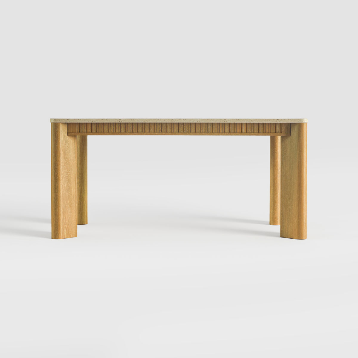 colamy verse 63 inch reeded dining table with fluted apron low angle view