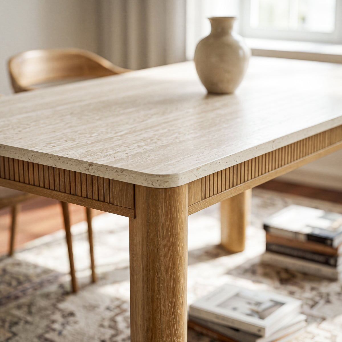 colamy verse travertine dining table rounded corner fluted apron corner detail
