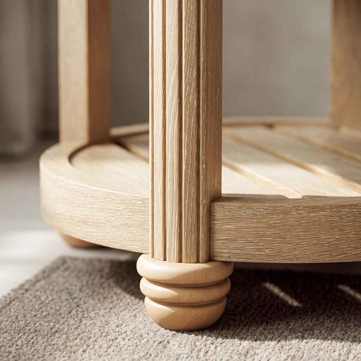 fluted round side table with drawer turned bun foot close up