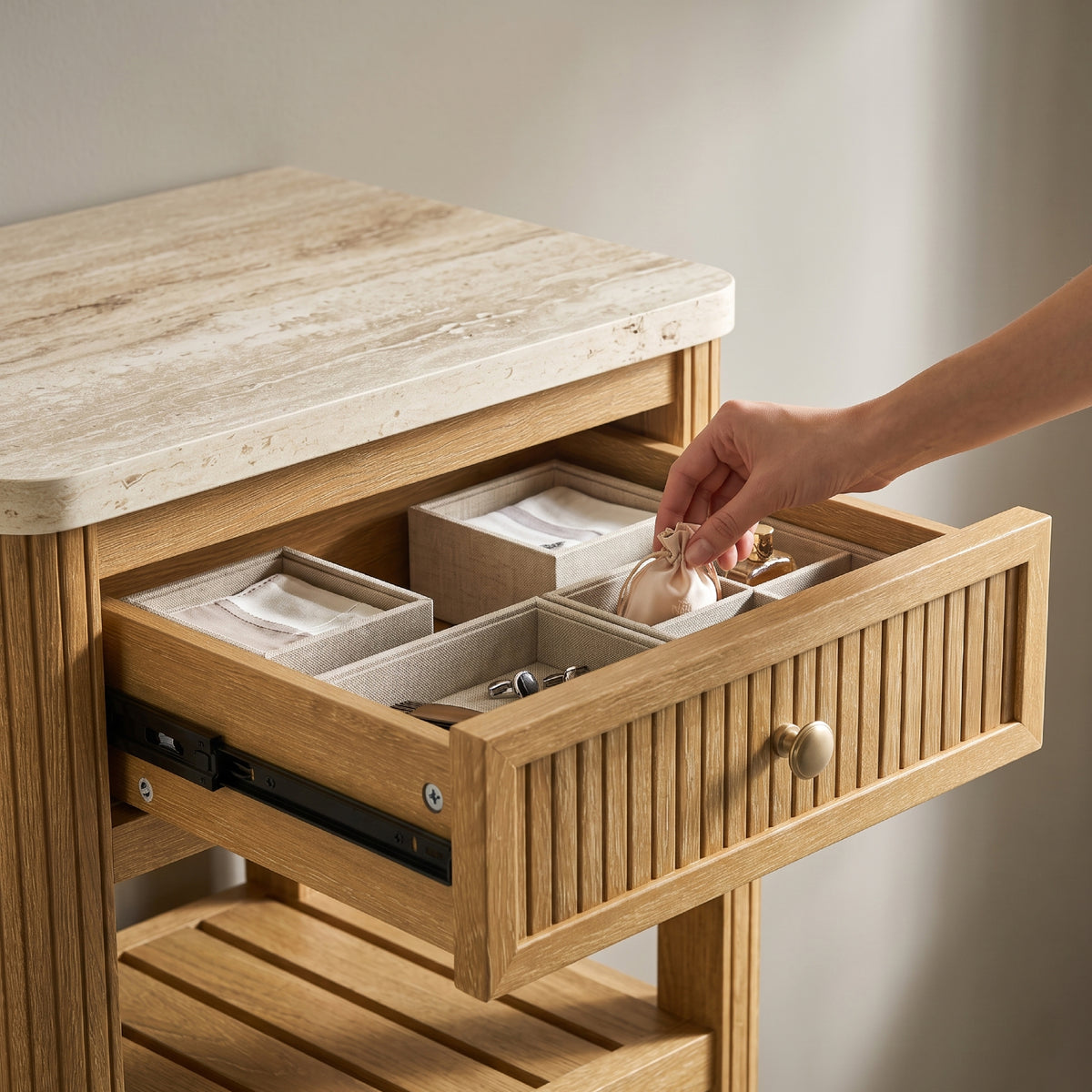 reeded end table with storage drawer fitted with fabric organizers for jewelry and accessories