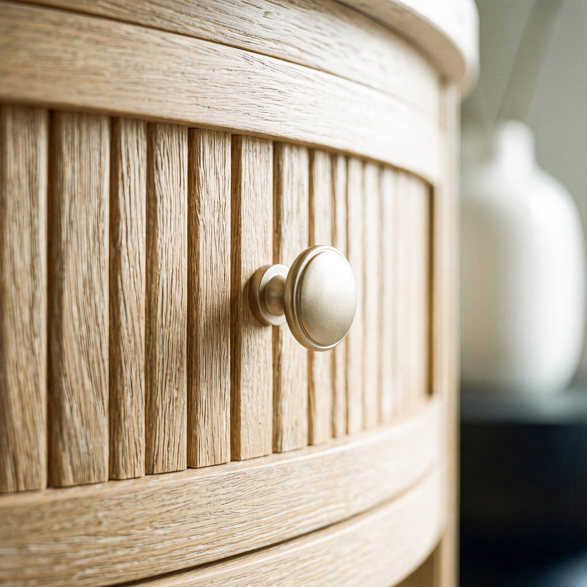 reeded side table with drawer light oak knob close up